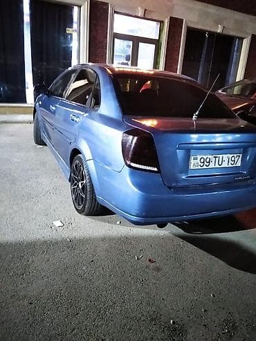 bmw e39 kapot: Chevrolet Lacetti sedan – mavi rəng. Xüsusiyyətlər: - Kuzov: 4 qapılı — 2