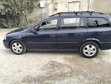 lapet satisi: Opel Astra Caravan (universal) – tünd mavi rəng. Xüsusiyyətlər: - — 5