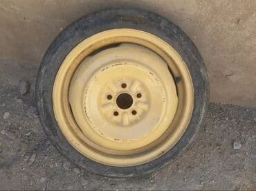 teker kreditle: Yüngül ehtiyat təkər (donqat) – polad disk ilə komplekt. - Rəng: sarı — 2