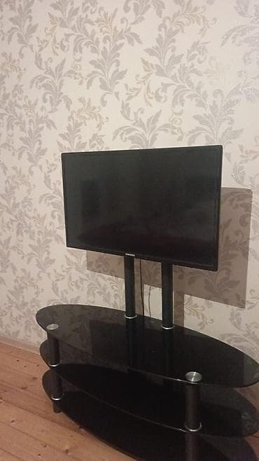 televizor yutublu: Samsung LCD televizor + TV stendi - Ekran: təxminən 32–40 düym, geniş — 1
