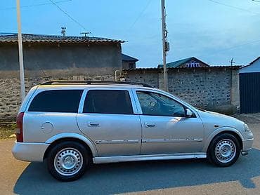 turbo az gazel: Opel Astra Caravan (universaI) – gümüşü rəng Xüsusiyyətlər: - Kuzov — 9