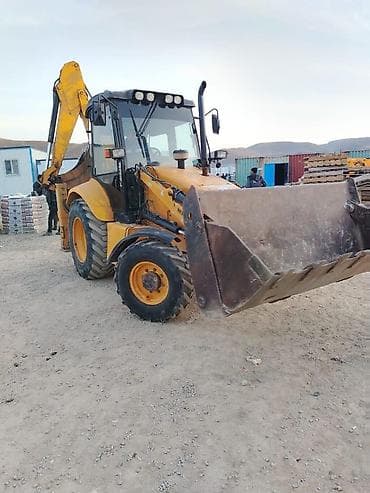 new holland: New Holland ekskavator-yükləyici - Marka/model: New Holland (bekhoe — 2