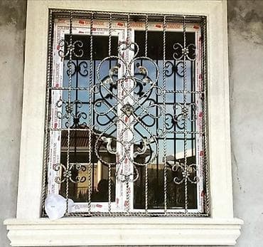 pencere dekor: Pəncərələr üçün müxtəlif dizaynlarda dəmir barmaqlıqlar. Bu — 2