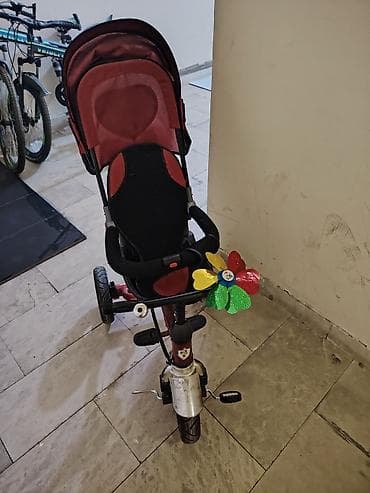 Uşaq üçtəkərli velosipedi – arabaya bənzər idarəetmə tutacağı ilə -