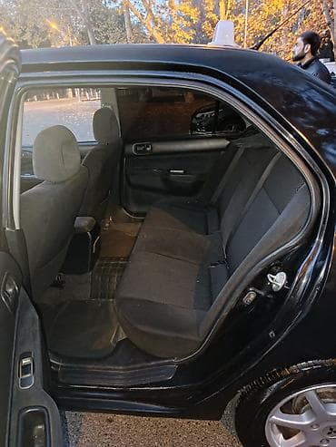 hyundai elantra teker: Mitsubishi Lancer: 1.6 l | 2005 il 290000 km Sedan — 8