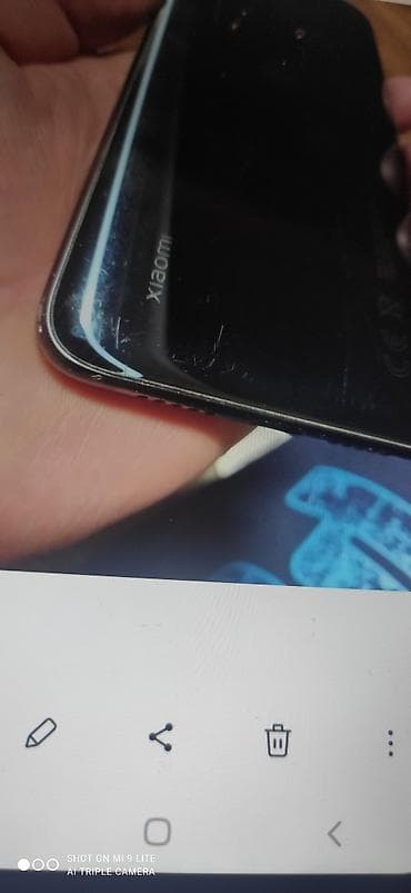 islemis telefonlarin satisi: Xiaomi Mi 9 Lite, rəng - Qara, 
 Barmaq izi — 5