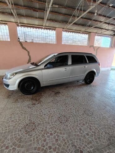disk təkər type 0: Opel Astra H hatchback – gümüş rəng. Əsas xüsusiyyətlər: 2006 furqon — 9