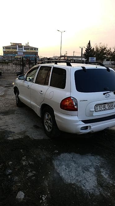 mitsubishi 2002 montero: Hyundai Santa Fe: 2.4 l | Krossover — 9
