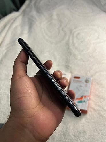 a 51 telefon: Samsung Galaxy A04e, 64 GB, rəng - Qara, Barmaq izi, Face ID — 6