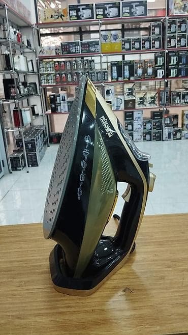 DSP buxarlı ütü - Güclü buxar funksiyası: geyimləri sürətlə yumşaldıb