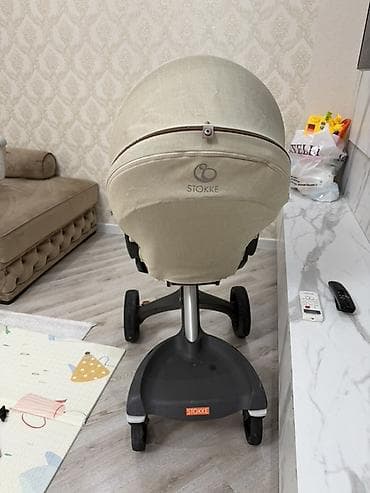 купить детскую коляску бу: Stokke brendi. 2300 azn alinib yeni kimi qalib. Tutacaqi yuxarida — 4