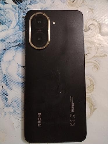 huawei qulaqciq: Redmi A5, 128 GB, rəng - Qara, İki sim kartlı — 1
