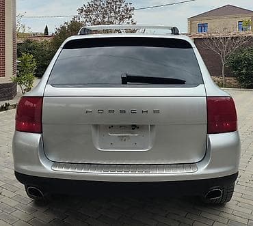 mitsubishi lancer evolution: Porsche Cayenne (1-ci nəsil) – gümüşü rəngdə premium SUV. İli 2008 — 10