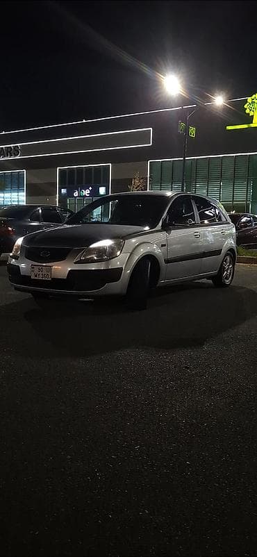 prius qapi: Kia Rio: 1.4 l | 2006 il Hetçbek — 6
