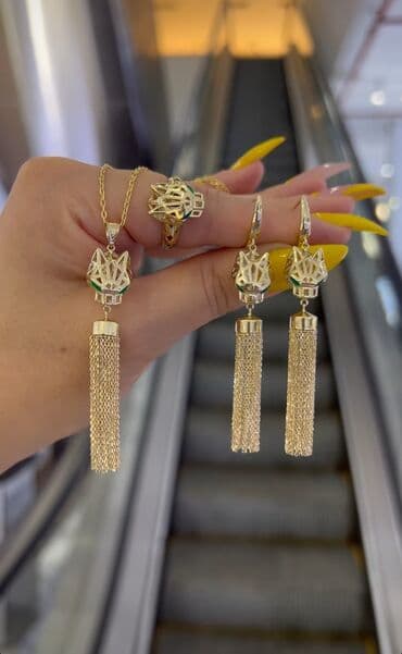 italyan qizili: Dəstə daxildir: Üzük, Sırğa, Kulon, Bvlgari, Sarı qızıl, 585 Əyar, 1736 g — 1