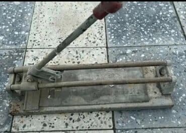 Əl ilə çalışan Kafel kəsən stanok