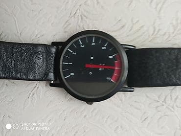 saat şamdan: Часы на кожаном ремешке с дизайном 1/mim ×1000 Германия — 1