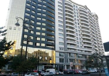 mingecevir yeni tikili binalar: Nizami metrosunun yaxınlığında 19 mertebeli binanın 14-cü — 16