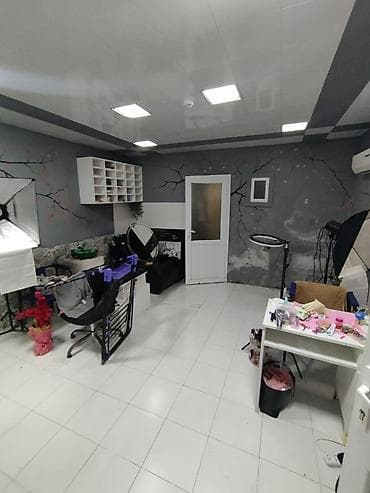 Daşınmaz əmlak: Əhmədli qəsəbəsi Qaçaq Nəbi küçəsi 1 ünvanında yerləşən 5 mərtəbəli — 2