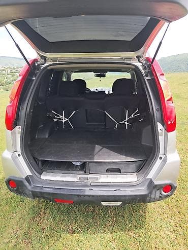taxi nişanı: Nissan X-Trail: 2 l | 2007 il Krossover — 3
