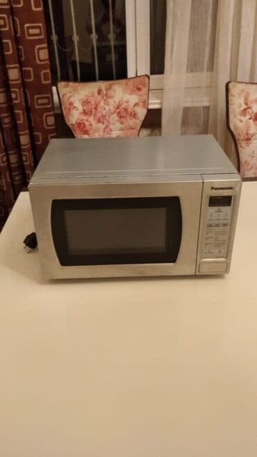 Информатика: Микроволновка Panasonic, Отдельностоящая, С микроволнами, цвет - Серый, Новый — 2