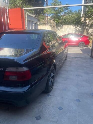 aston martin db7 5.9 at: BMW 5 series: 2.5 л | 1999 г. Седан — 4