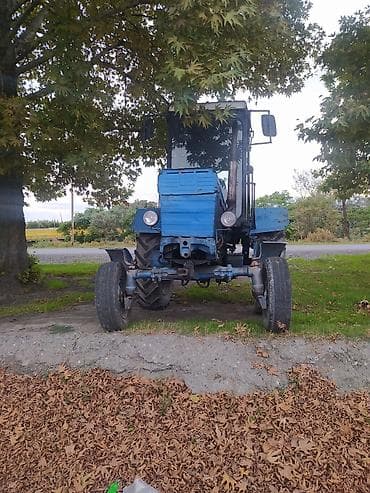 masin bmv: Mavi rəngli təkərli kənd təsərrüfatı traktoru - Kabinli, geniş — 2