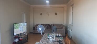 turkanda: 4 otaqlı, 108 kv. m, Orta təmir — 16