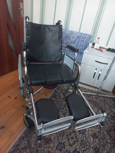 əlillər üçün araba: Əlil arabasi ayaqi qalxir kureyi uzanir — 1