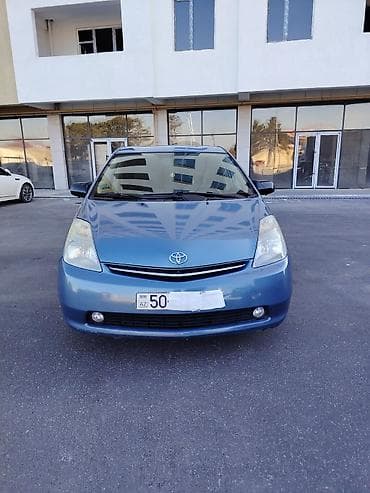 ford ehtiyat hisseleri: Toyota Prius (2-ci nəsil) hibrid hetçbek - Rəng: mavi - Salon: boz — 2