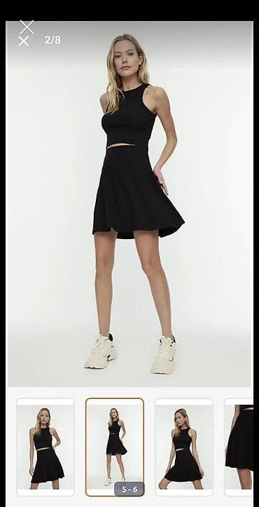 qara etek: Qara mini ətək - Kəsim: A-kəsim, ətəyin aşağı hissəsi yüngülcə — 5