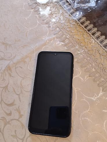 nokia 216 wifi: Smartfon – qara rəngdə, damla tipli (notch) ön kamera kəsiyi olan tam — 1