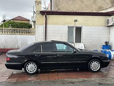 mercedes logo: Mercedes-Benz E-Class (W210) sedan Diski teker satilir - Korpus: 4 — 1