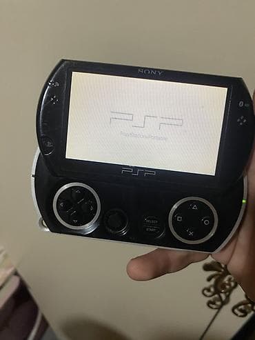 bluetooth qulaqciq: Sony PSP Go portativ oyun konsolu Ustada olmayib zavoddur bilenler — 7