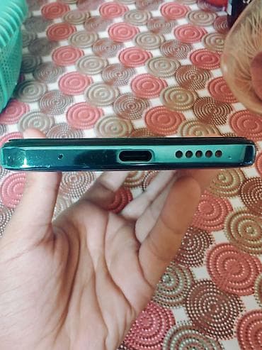 adapdir: Redmi 128 GB, rəng - Mavi, Barmaq izi — 4