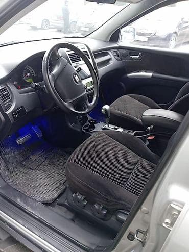 volkswagen tiguan ii: Kia Sportage: 2 л | 2007 г. Универсал — 5