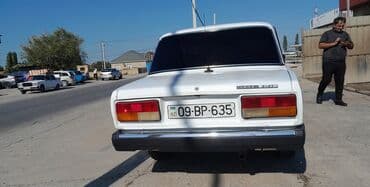 колпаки для дисков: Model: Lada 2107 Kuzov: sedan, 4 qapı Rəng: ağ Nömrə nişanı: 09-BP-635 — 2