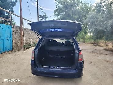 luaz satilir: Opel Astra: 1.3 l | 2006 il 475532 km Universal — 4