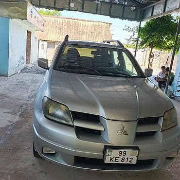 arxa şuşə: Mitsubishi Outlander: 2.4 l | 2002 il 315594 km Krossover — 7
