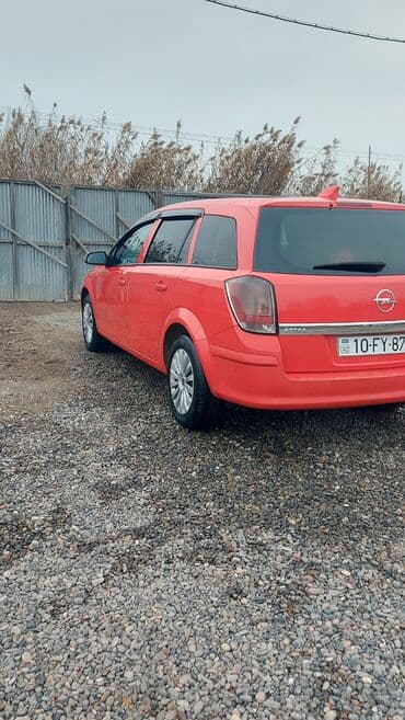 pobeda (maşın): Opel Astra: 1.3 l | 2009 il Universal — 4