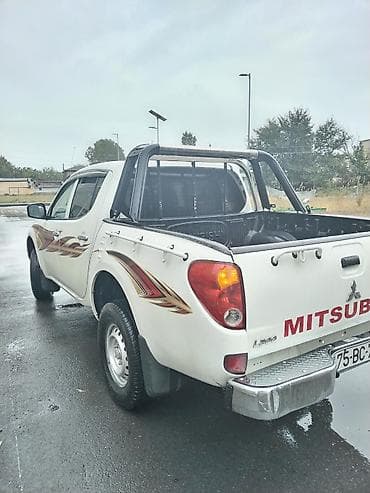 brabus disk: Mitsubishi L200: 2.4 l | 2008 il 302118 km Pikap — 2