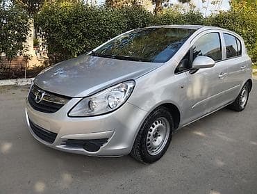 kuba portero 8000: Opel Corsa D, 5 qapılı hetçbek, gümüşü rəng. Texniki xüsusiyyətlər: - — 7