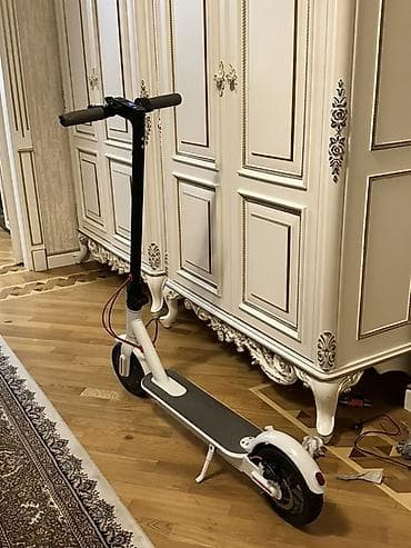 Elektrik nəqliyyatı: Ag rengdedir,qatlana bilir,3 rejmi var eco-15 drive-20 — 2