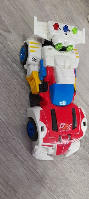 oyuncaq buldozerlər: Az islenmis hen robot hem masin,musiqili duymeleri var . 15man — 2