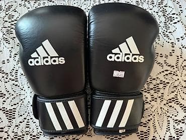 Adidas markalı, qara rəngdə tam dəri boks əlcəkləri satılır. Tam — 3