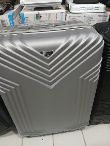 купить чемодан на колесах: Dörd təkərli səyahət çantası, möhkəm materialdan hazırlanmışdır və — 5