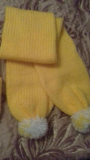 Usaq ucun toxunmus papaq ve sarf iki tereflidir qalindir, hem sarf hem