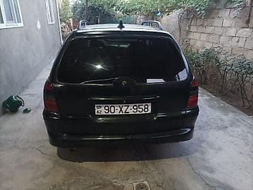 tesla model 3: Opel Vectra: 1.8 l | 2000 il 420000 km Universal — 4