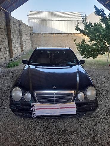 Mercedes-Benz E 220: 2.2 л | 1999 г. Седан