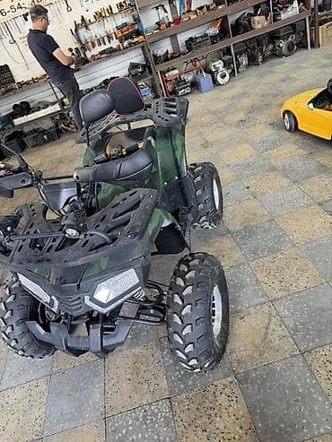 atv maşın: ATV kross – 4 təkərli, kamuflyaj gövdə rəngi Xüsusiyyətlər: - Güclü — 1